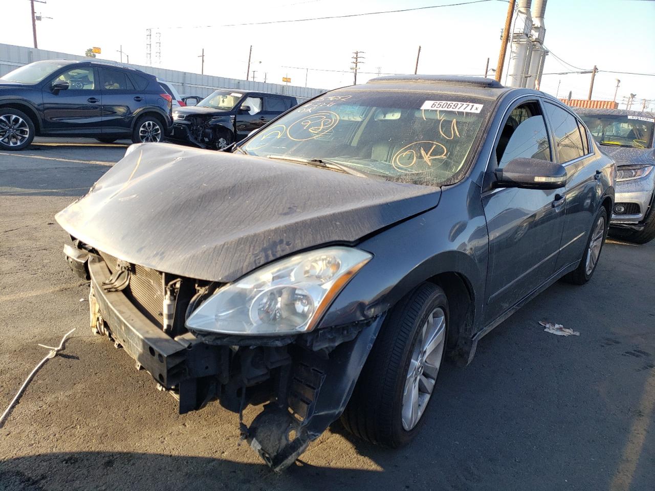 Photo 2 from auction – 2011 NISSAN ALTIMA SR with VIN 1N4BL2AP9BC183364