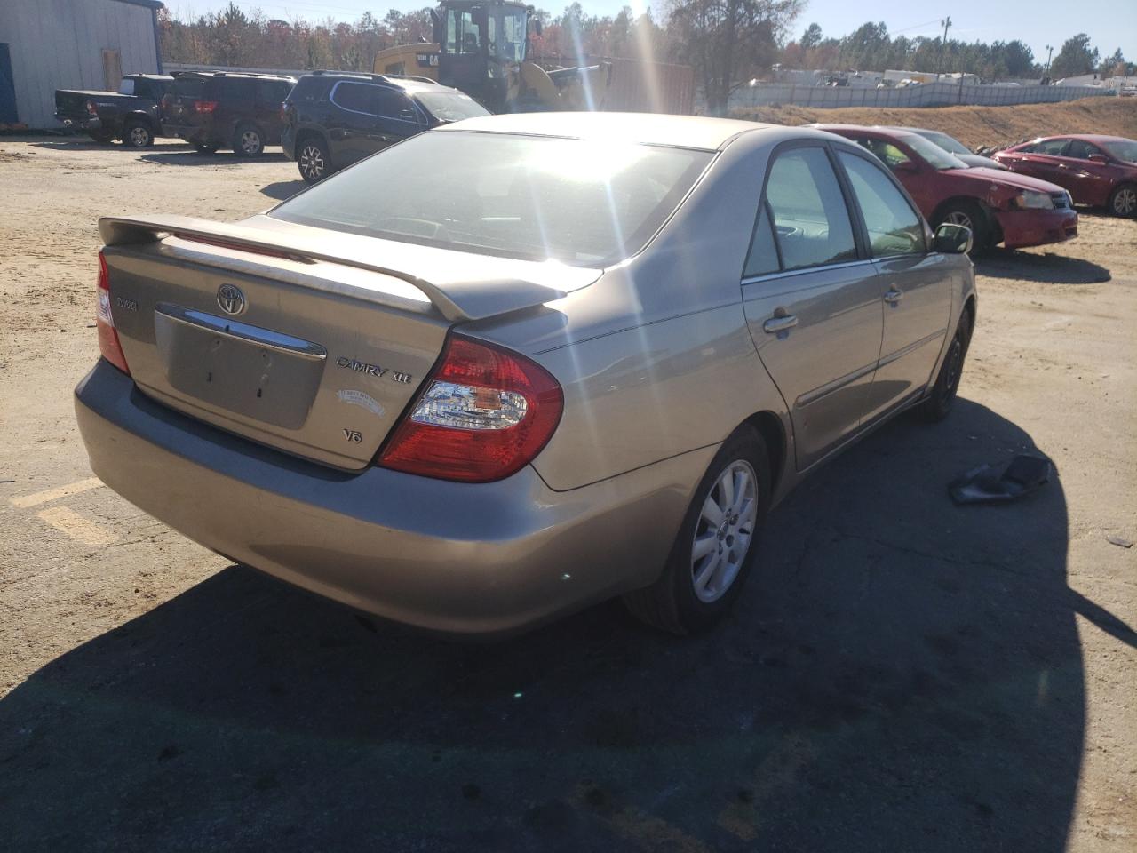 Photo 4 from auction – 2004 TOYOTA CAMRY LE with VIN 4T1BF30K14U576491