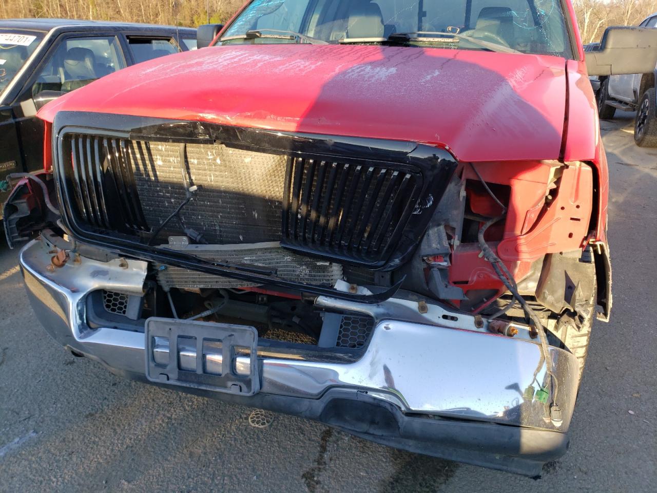 Photo 9 from auction – 2004 FORD F150 with VIN 1FTPX125X4NB34208