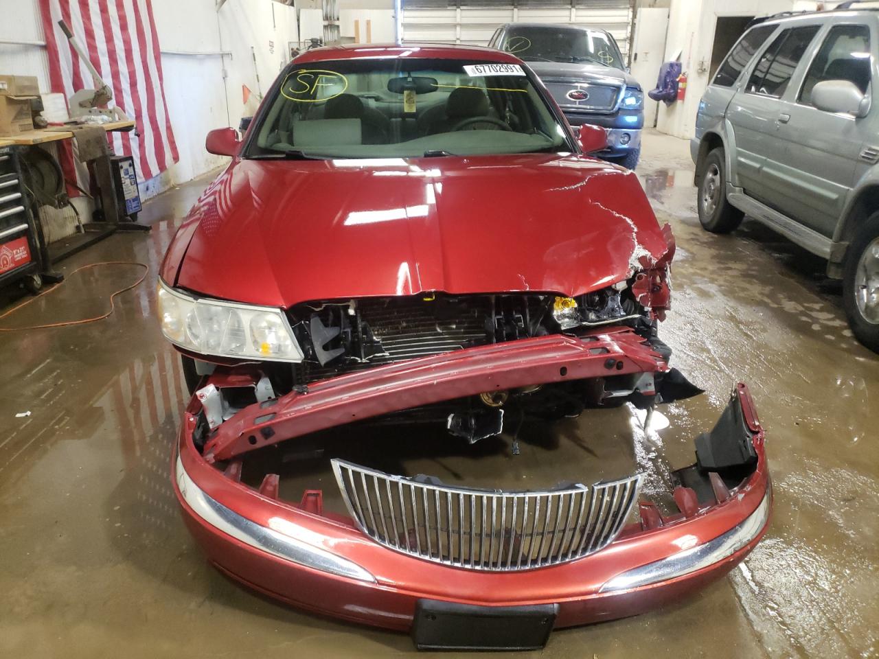 Photo 7 from auction – 1999 LINCOLN CONTINENTA with VIN 1LNHM97V5XY703159