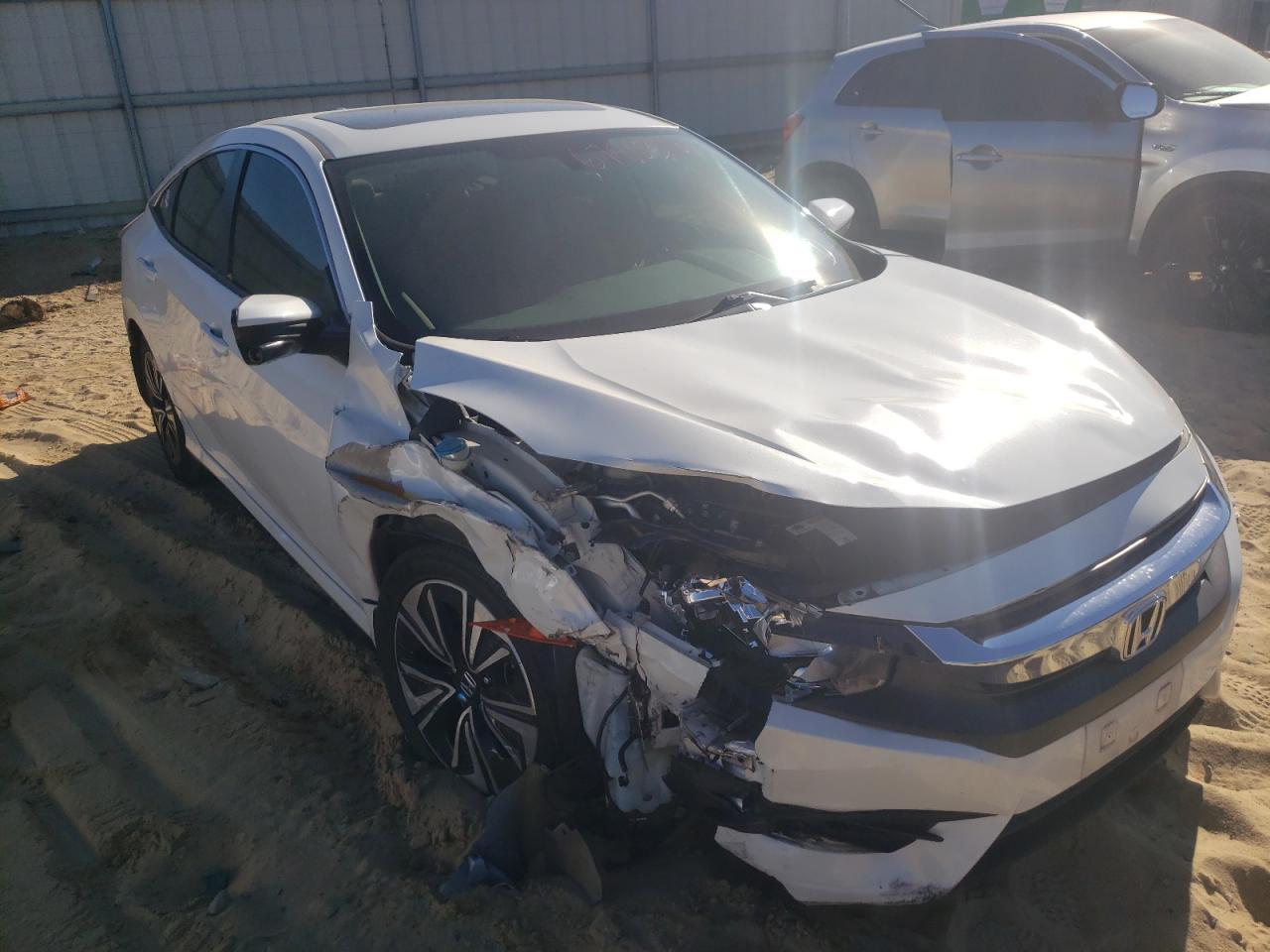 HONDA CIVIC EX 2017 with VIN 2HGFC1F3XHH638905 - Photo from auction