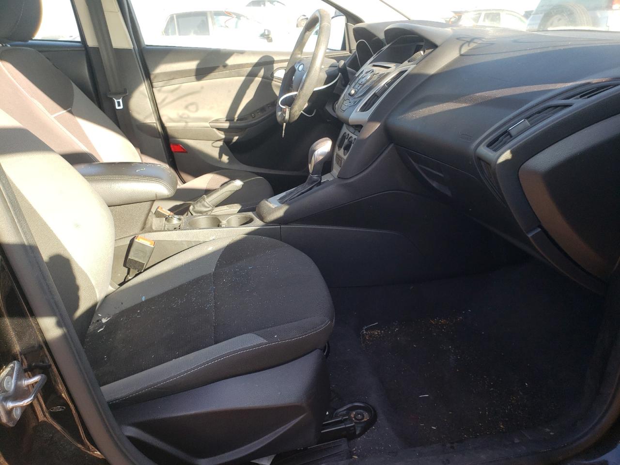 Foto 5 de la subasta – 2014 FORD FOCUS SE con VIN 1FADP3F27EL461781