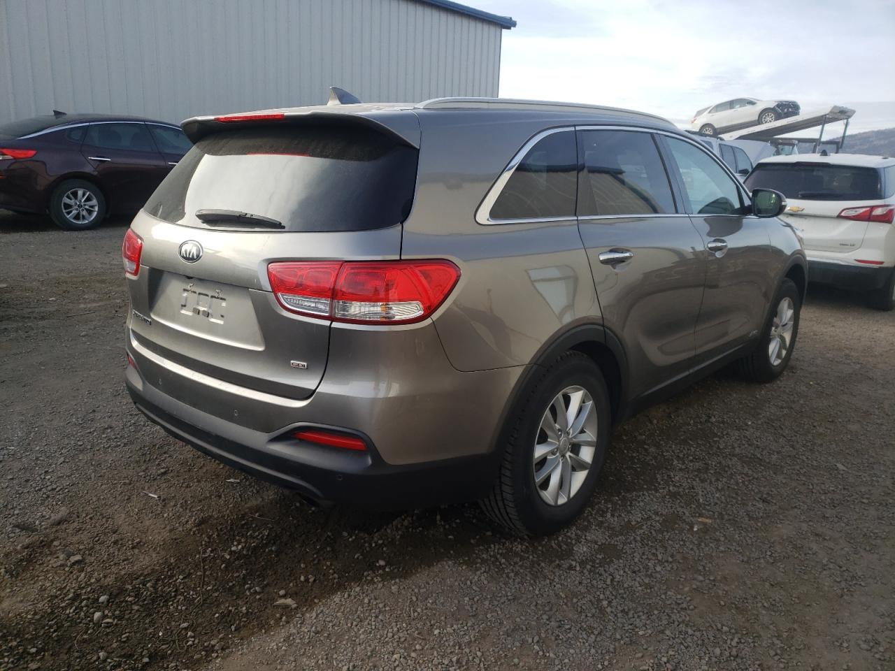 Photo 4 from auction – 2016 KIA SORENTO LX with VIN 5XYPGDA32GG065723