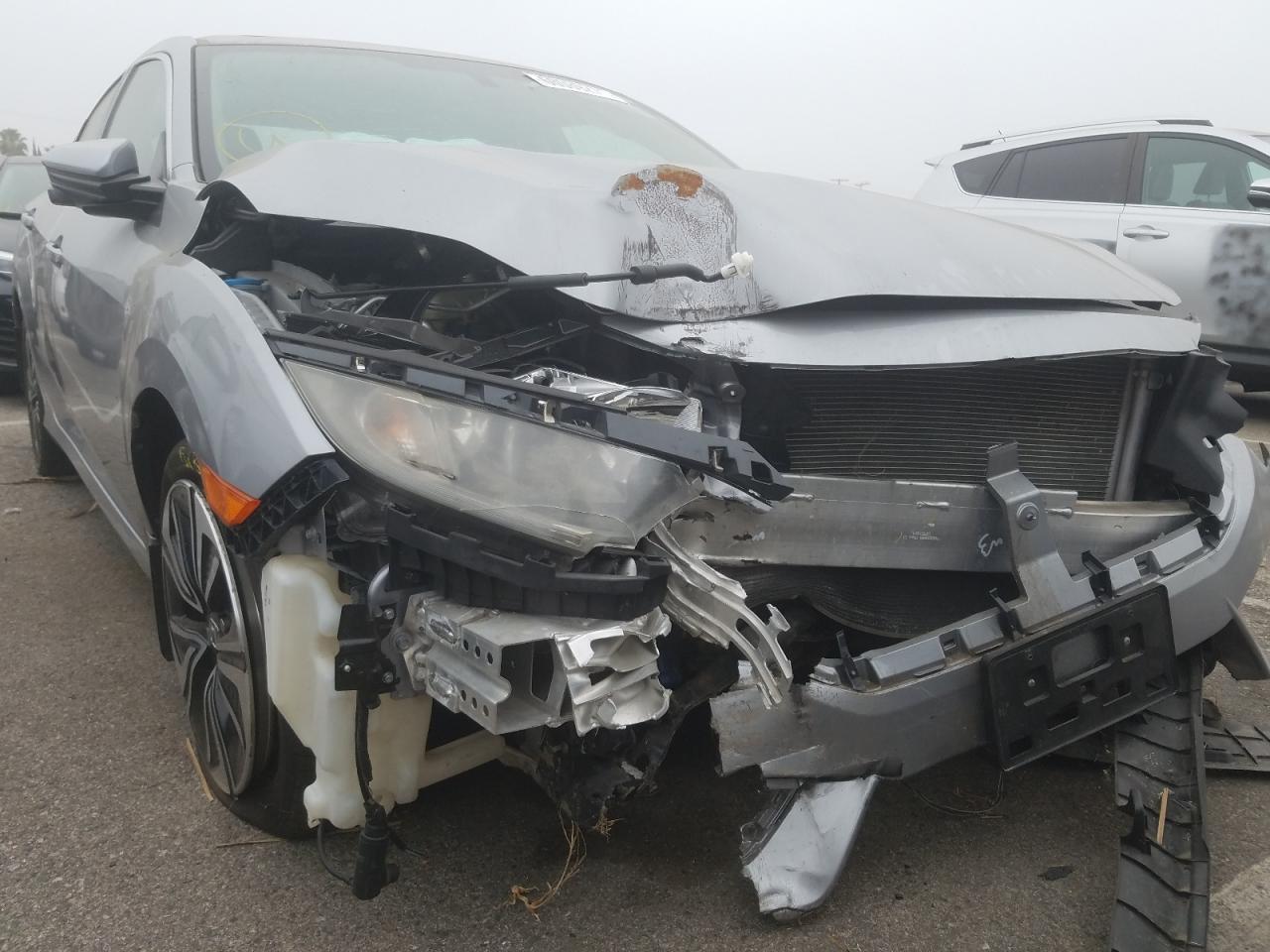 Photo 9 from auction – 2016 HONDA CIVIC EX with VIN 2HGFC1F38GH642174