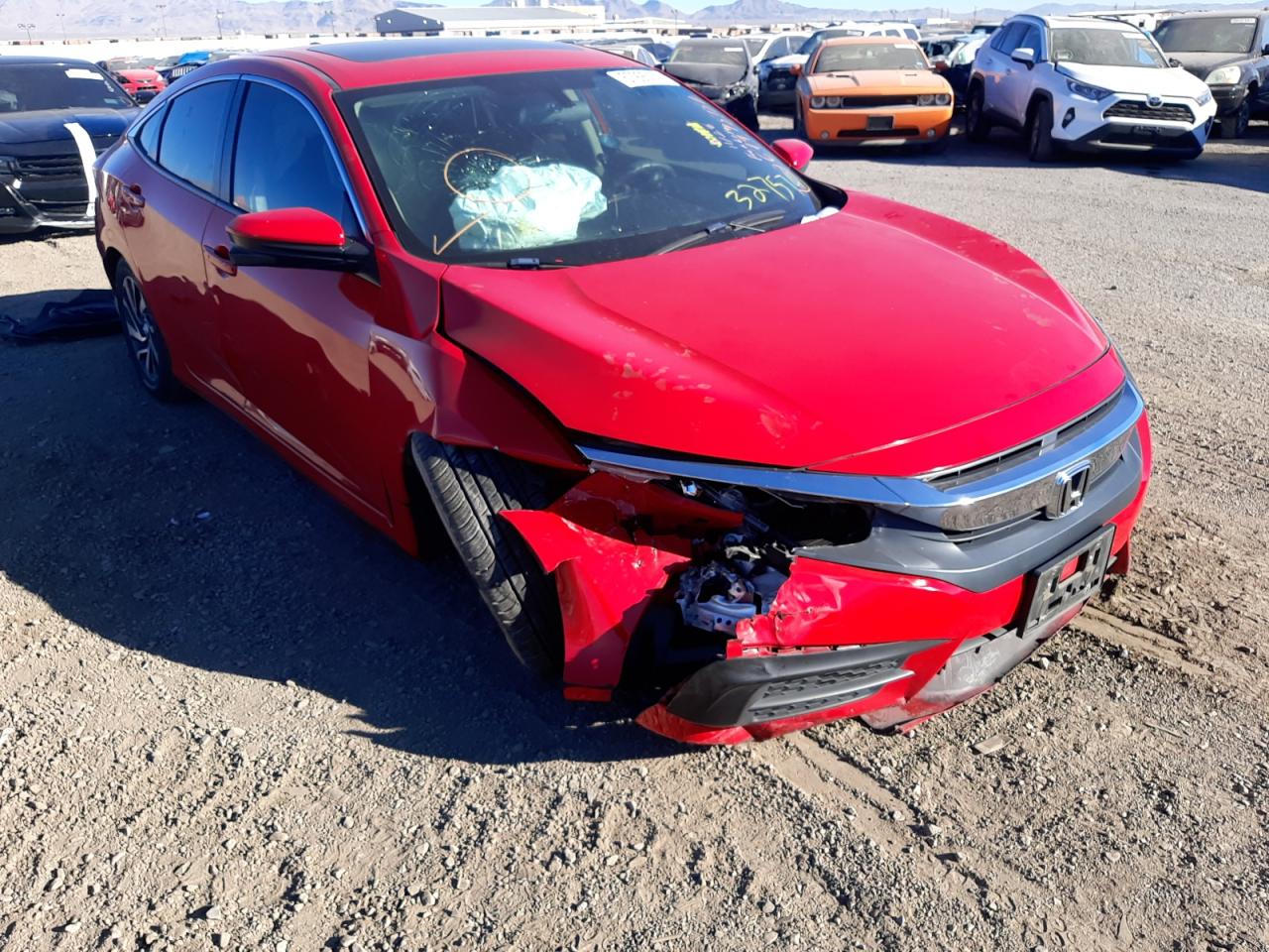 HONDA CIVIC EX 2017 with VIN 2HGFC2F74HH557066 - Photo from auction