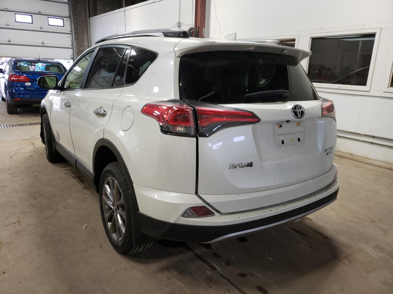 Photo 3 from auction – 2018 TOYOTA RAV4 LIMIT with VIN JTMDFREV1JJ178617