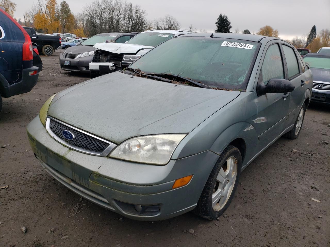 Photo 2 from auction – 2000 FORD FOCUS with VIN 1FAHP34NX6W215693
