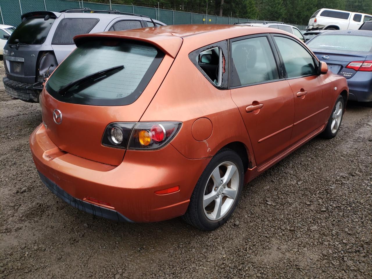 Photo 4 from auction – 2004 MAZDA 3 HATCHBAC with VIN JM1BK343141100813