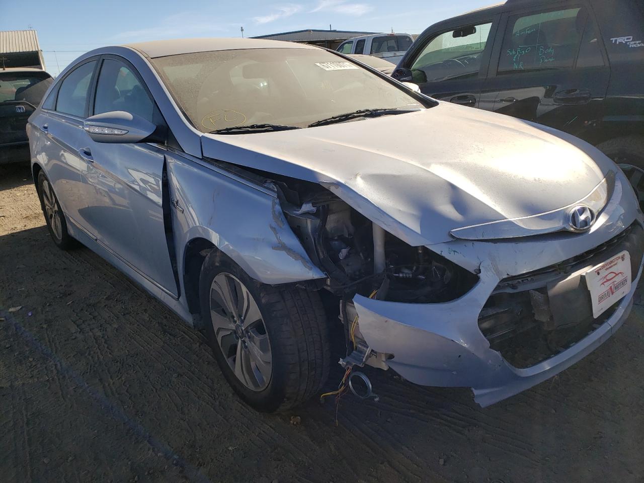 HYUNDAI SONATA HYB 2015 with VIN KMHEC4A49FA130525 - Photo from auction