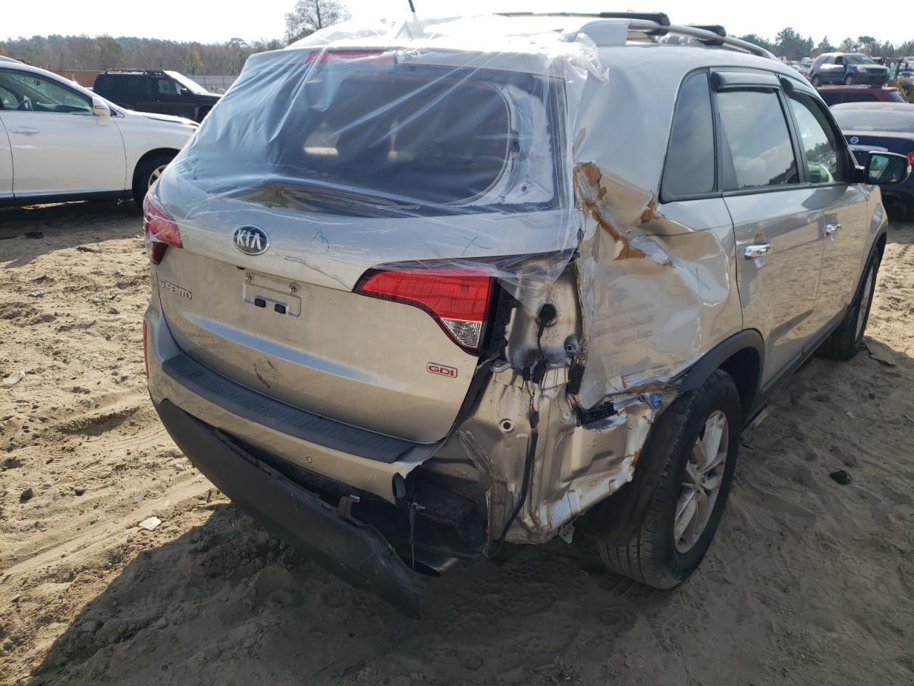 Photo 9 from auction – 2014 KIA SORENTO LX with VIN 5XYKT4A69EG493561