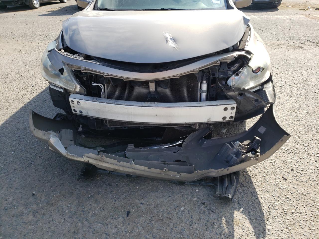 Photo 9 from auction – 2013 NISSAN ALTIMA 2.5 with VIN 1N4AL3AP1DN561203
