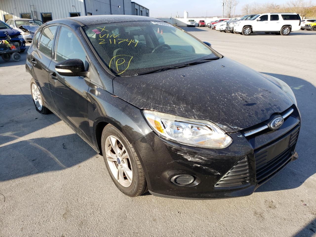 FORD FOCUS SE 2014 with VIN 1FADP3K24EL211744 - Photo from auction