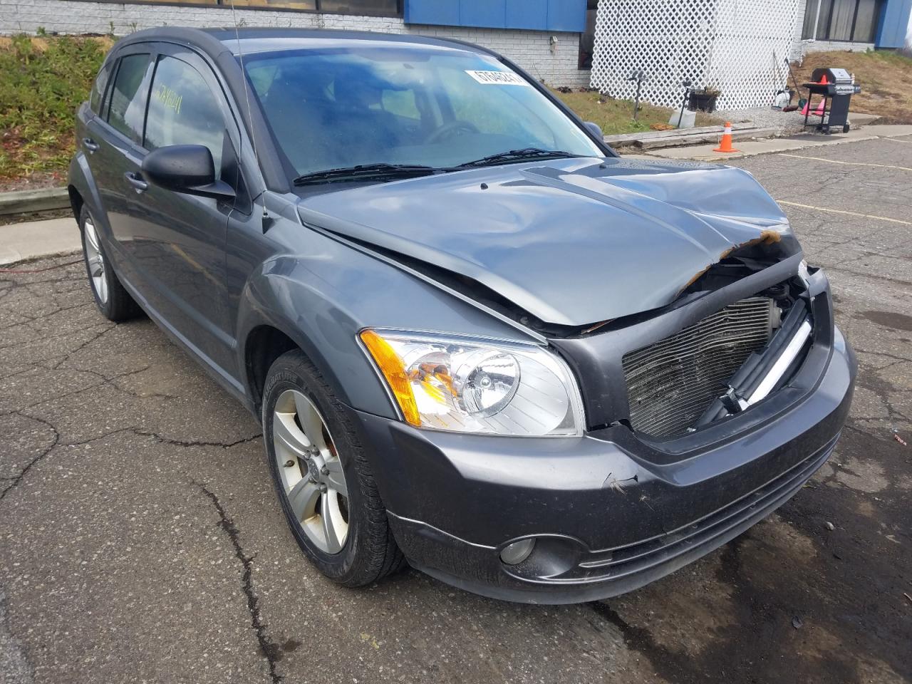 DODGE CALIBER MA 2011 with VIN 1B3CB3HA0BD261678 - Photo from auction