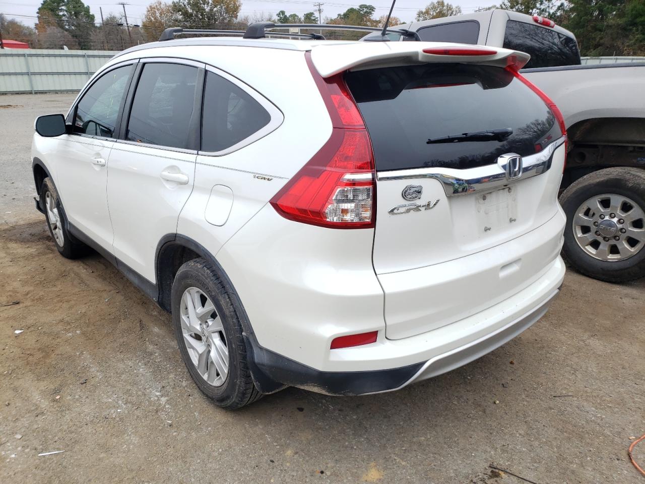 Photo 3 from auction – 2015 HONDA CR-V EXL with VIN 5J6RM3H77FL010556