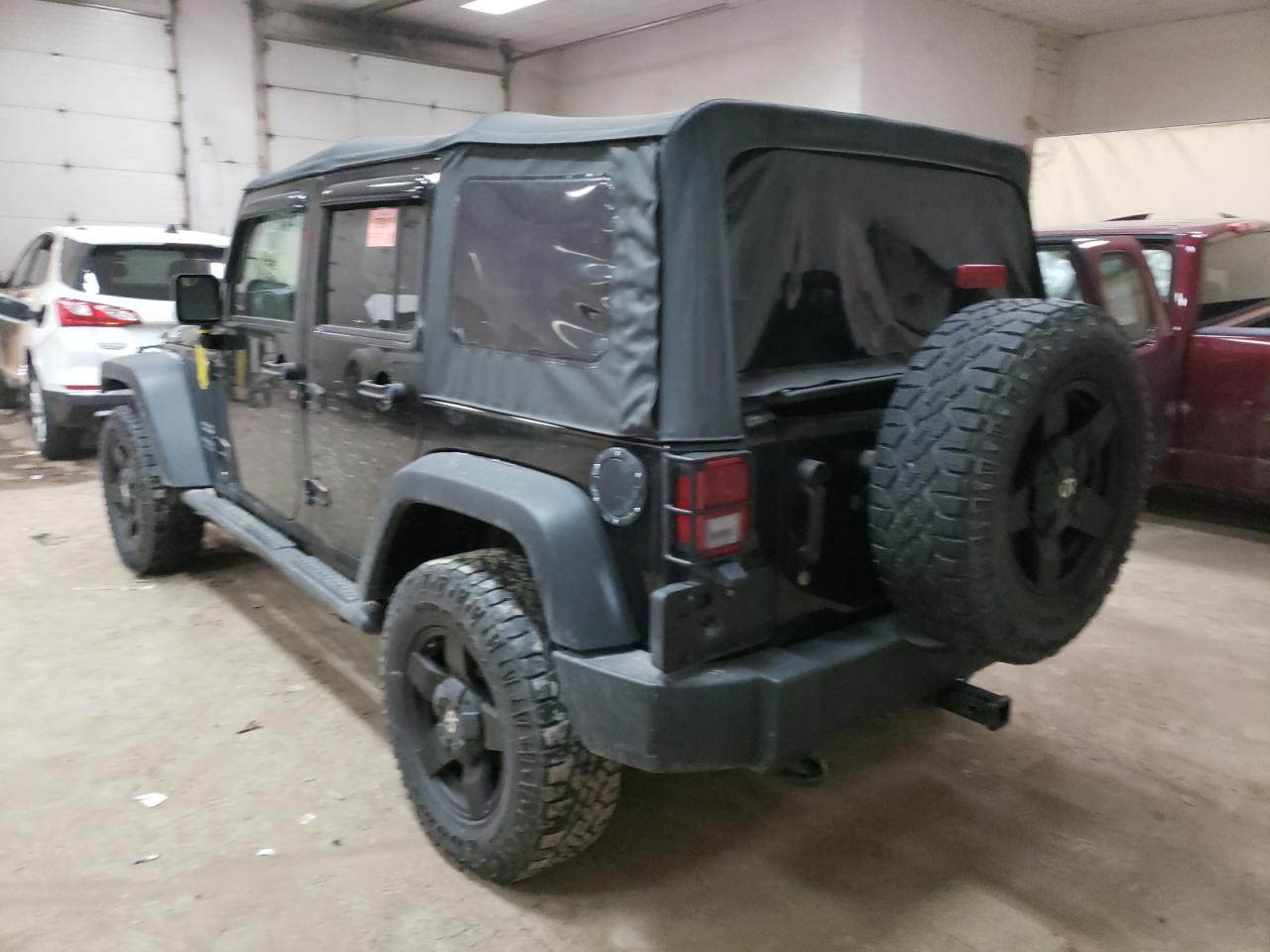 Photo 3 from auction – 2014 JEEP WRANGLER U with VIN 1C4BJWDG6EL218496