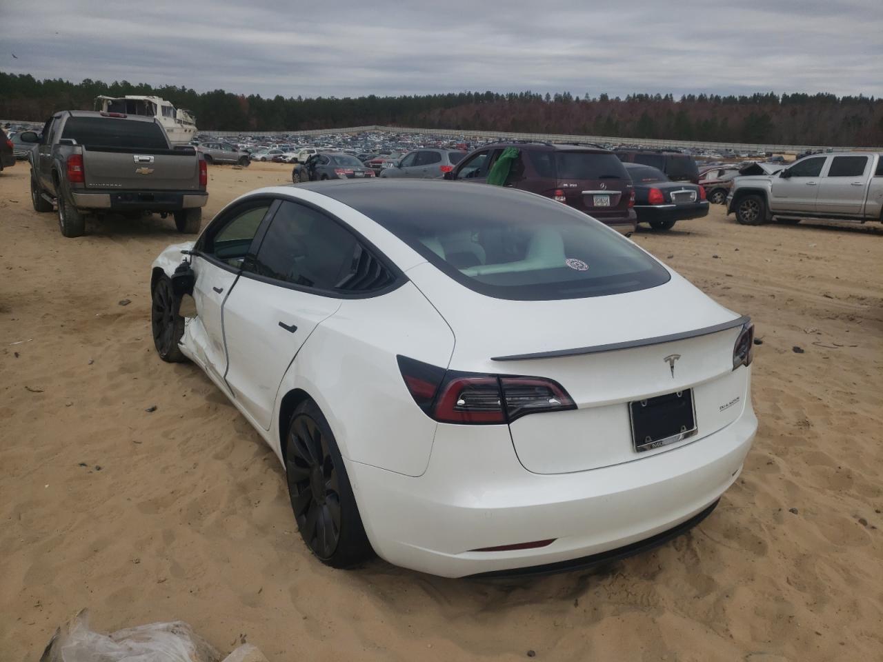 Photo 3 from auction – 2021 TESLA MODEL 3 with VIN 5YJ3E1ECXMF035515