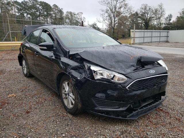 FORD FOCUS SE 2017 with VIN 1FADP3FE1HL281100 - Photo from auction
