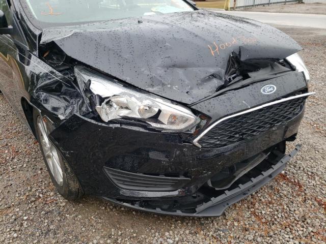 Photo 9 from auction – 2017 FORD FOCUS SE with VIN 1FADP3FE1HL281100