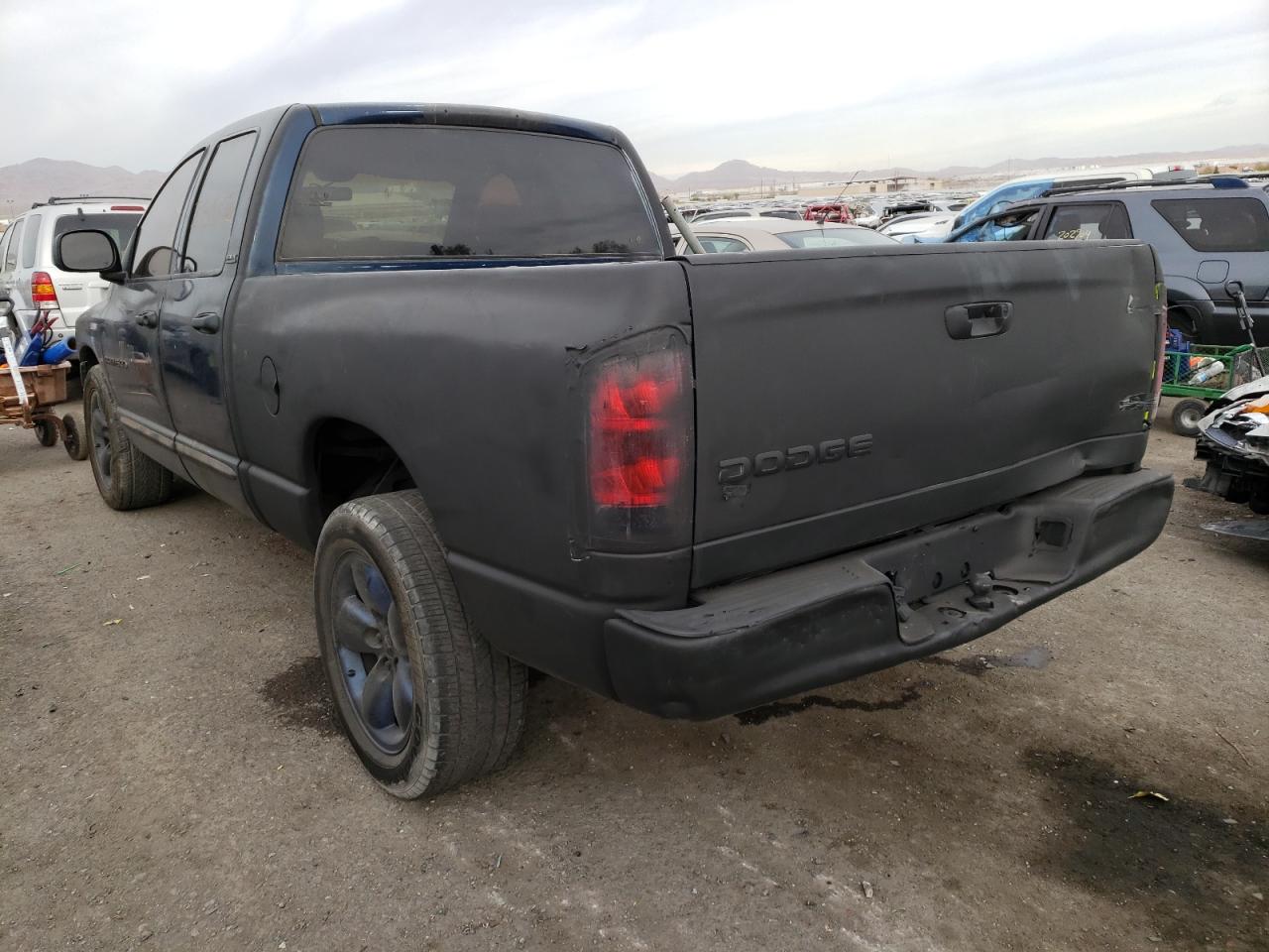 Photo 3 from auction – 2002 DODGE 1500 with VIN 1B7HA18N32J102329