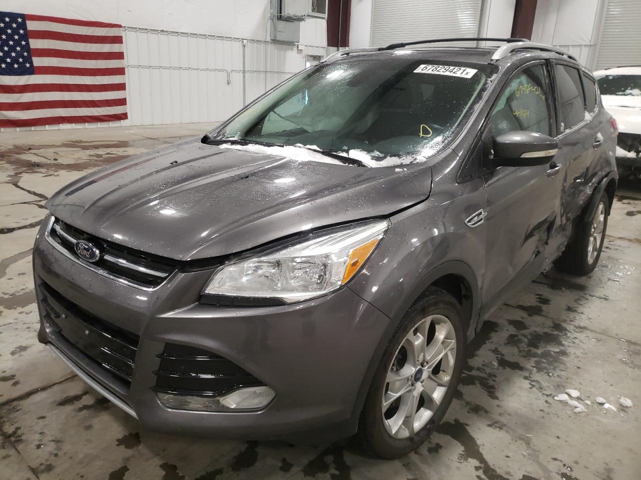 Photo 2 from auction – 2014 FORD ESCAPE TIT with VIN 1FMCU9J99EUA70787