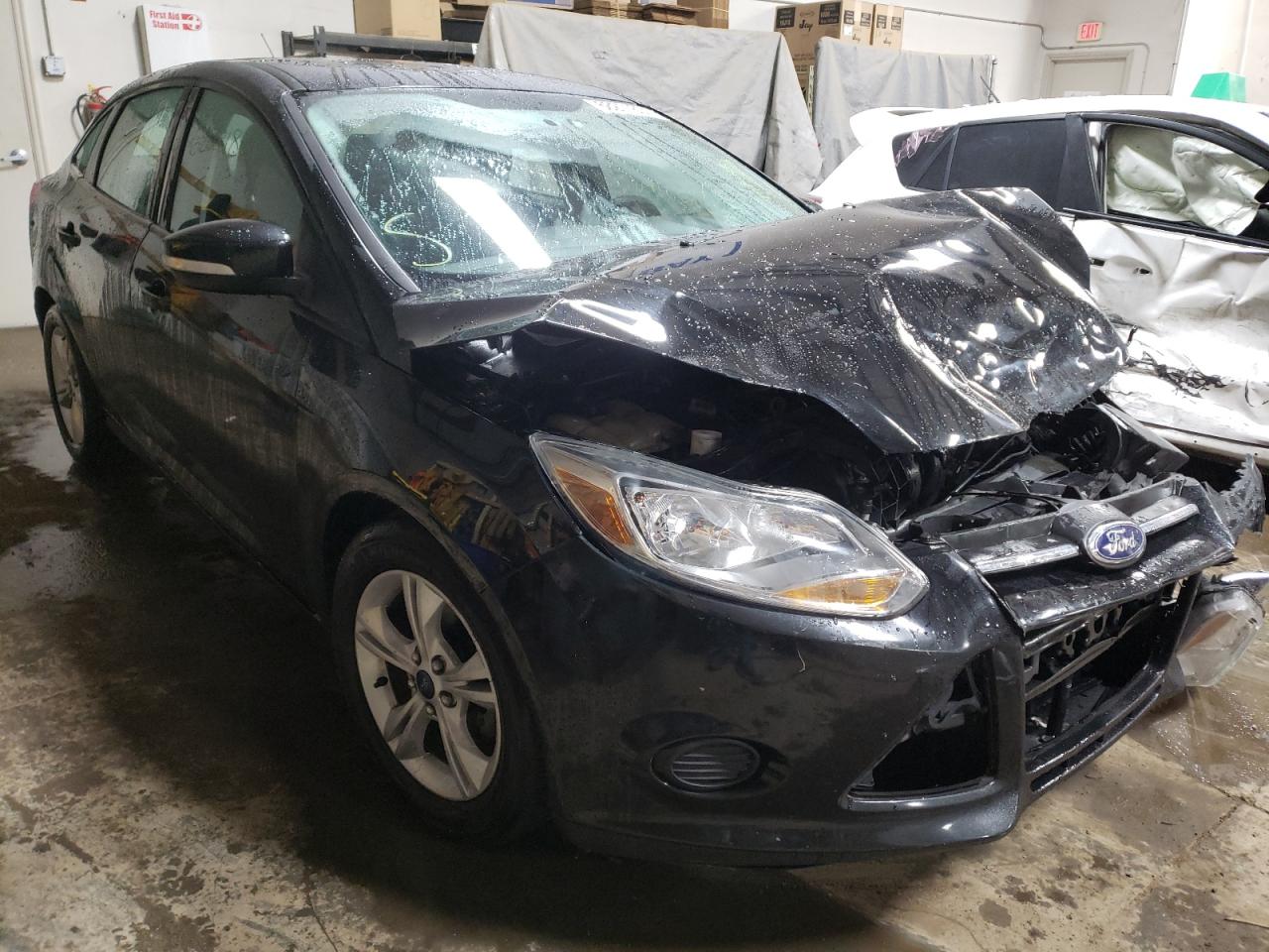 FORD FOCUS SE 2014 with VIN 1FADP3F26EL371201 - Photo from auction