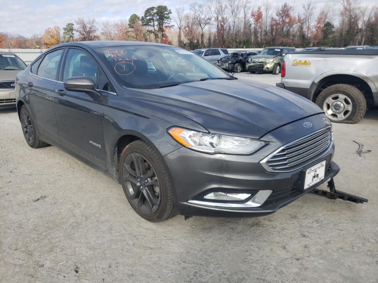 FORD FUSION SE 2018 with VIN 3FA6P0LU7JR249259 - Photo from auction