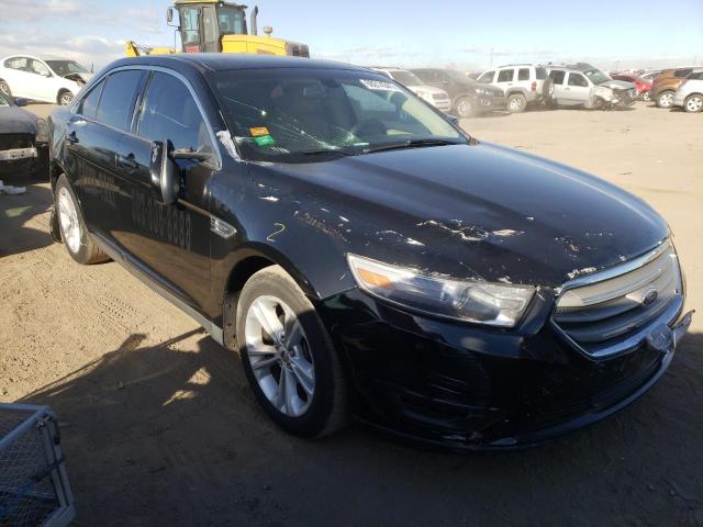 FORD TAURUS 2014 with VIN 1FAHP2E86EG137795 - Photo from auction