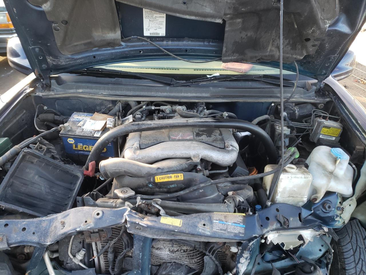 Photo 7 from auction – 2003 CHEVROLET TRACKER LT with VIN 2CNBJ634536941958