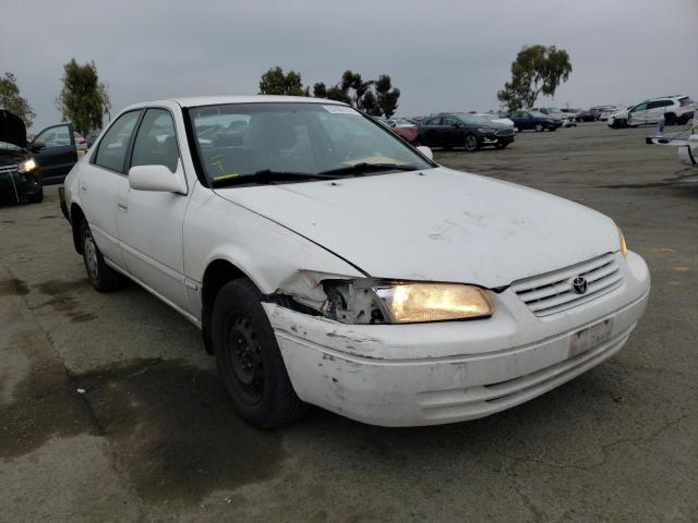 TOYOTA CAMRY LE 1997 with VIN JT2BG22K2V0048842 - Photo from auction