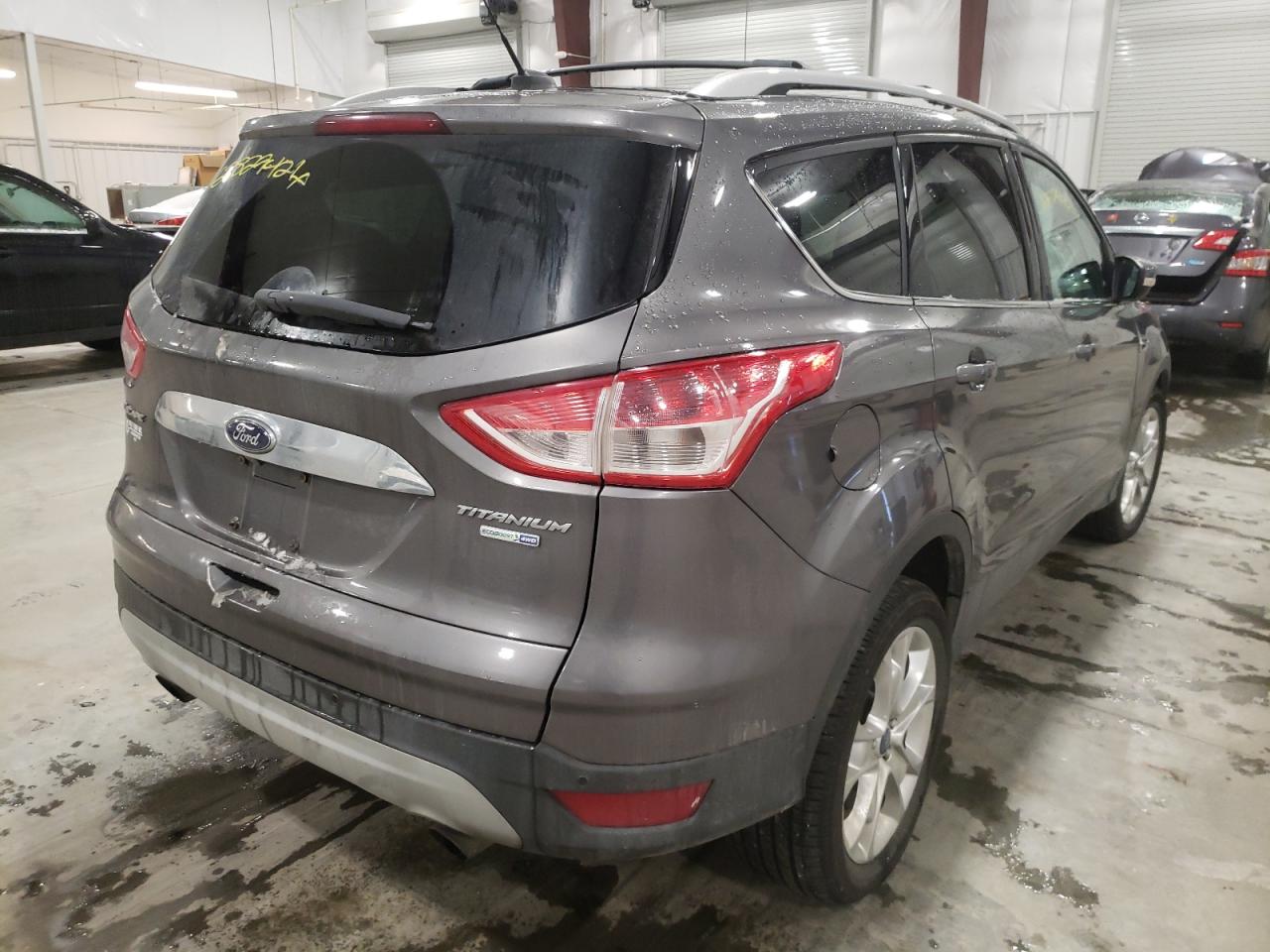 Photo 4 from auction – 2014 FORD ESCAPE TIT with VIN 1FMCU9J99EUA70787