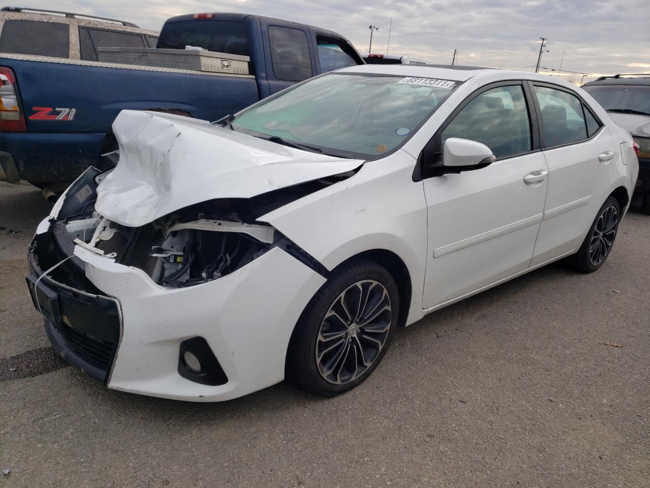 Photo 2 from auction – 2015 TOYOTA COROLLA L with VIN 2T1BURHE2FC270525