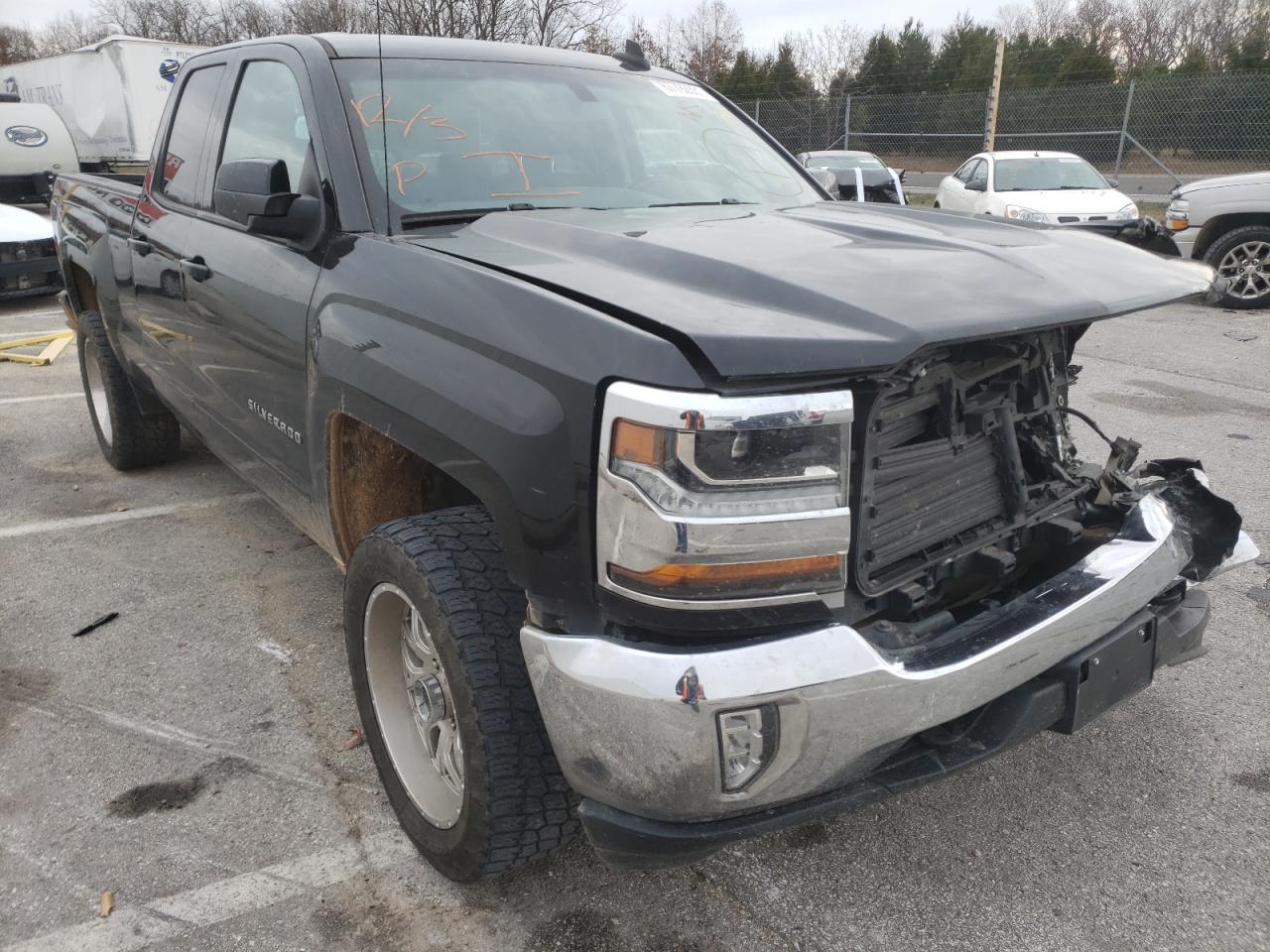 CHEVROLET SILVERADO 2018 with VIN 1GCVKREC2JZ125876 - Photo from auction