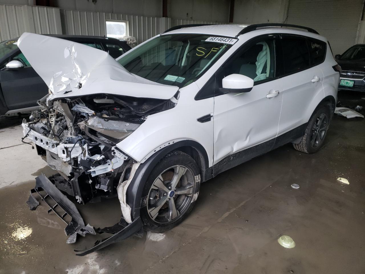 Photo 2 from auction – 2017 FORD ESCAPE SE with VIN 1FMCU9G90HUC83705