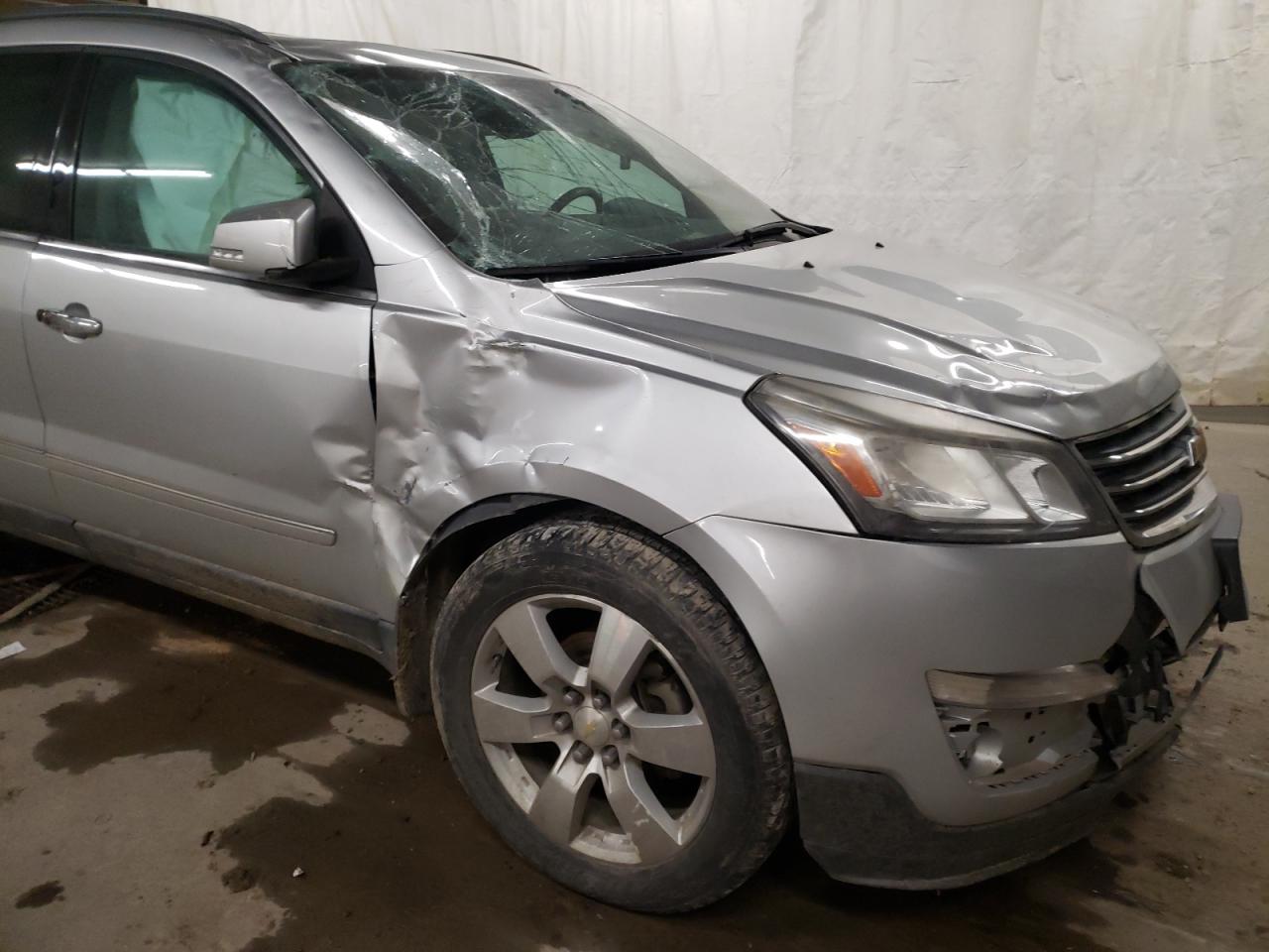 Photo 9 from auction – 2014 CHEVROLET TRAVERSE L with VIN 1GNKRJKD7EJ210270