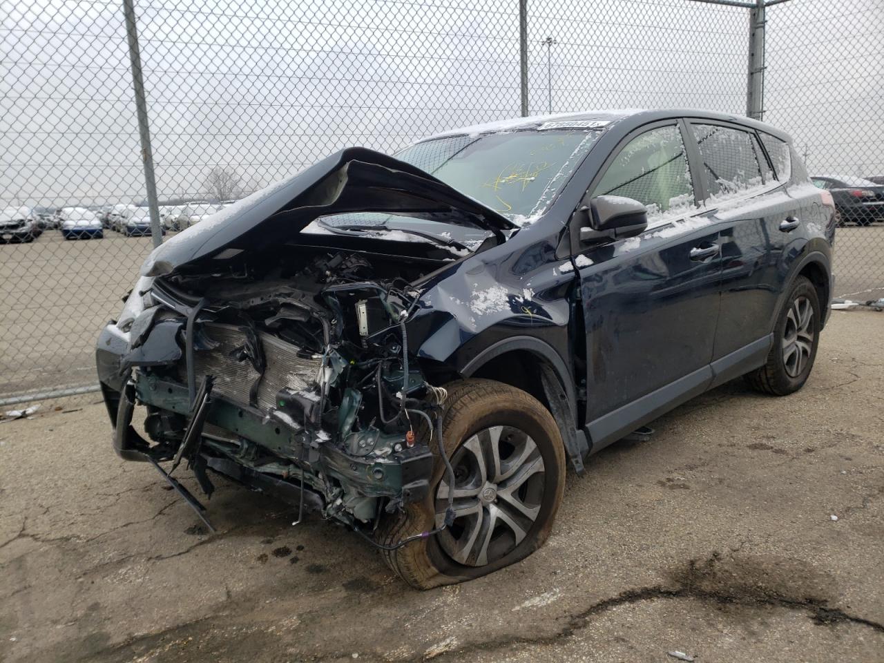 Photo 2 from auction – 2017 TOYOTA RAV4 LE with VIN JTMBFREV3HJ174392