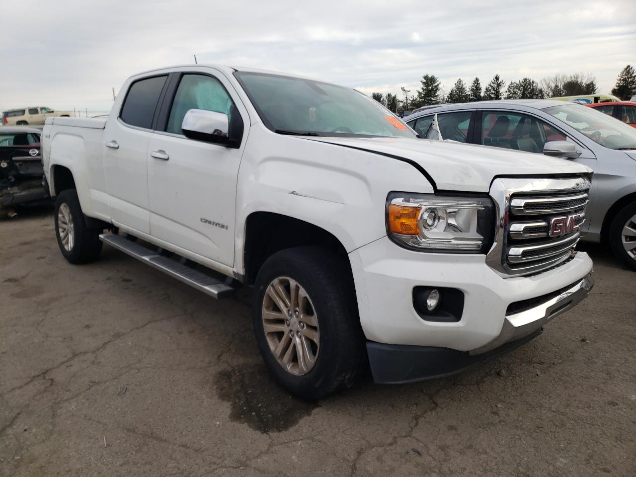 GMC CANYON SLT 2015 with VIN 1GTG6CE33F1114708 - Photo from auction