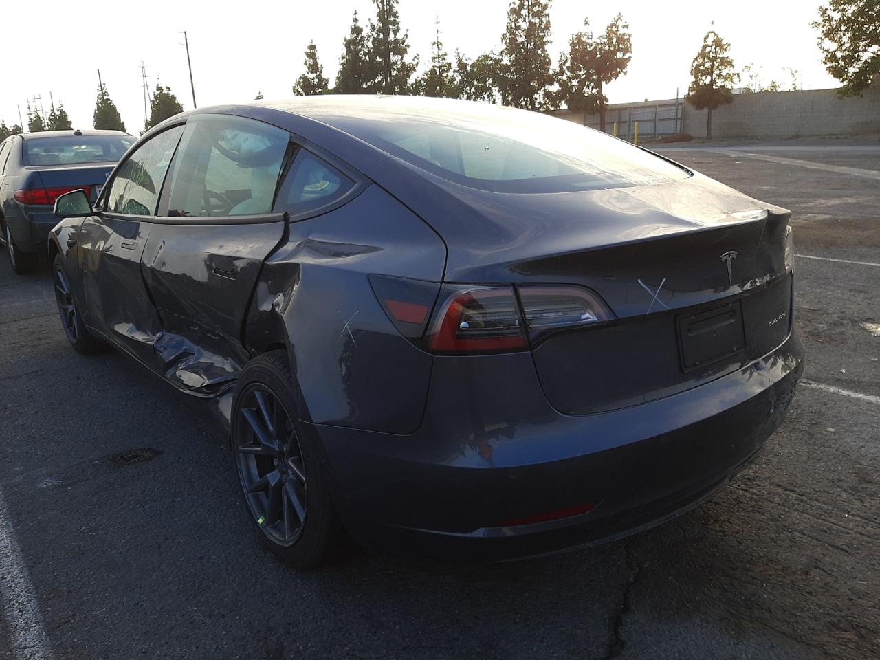 Photo 3 from auction – 2021 TESLA MODEL 3 with VIN 5YJ3E1EB2MF033457