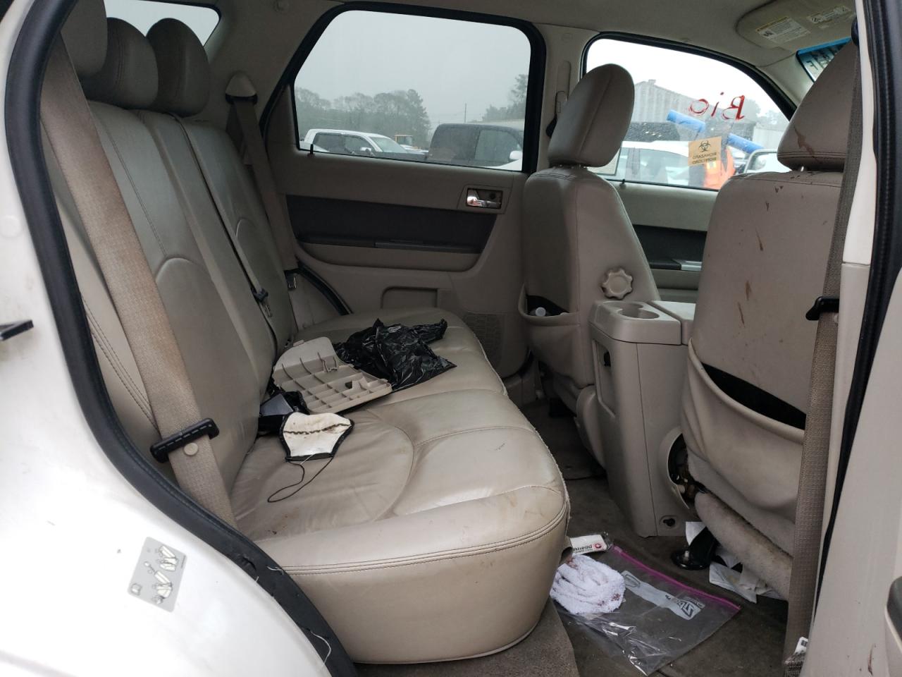 Photo 6 from auction – 2010 MERCURY MARINER PR with VIN 4M2CN8H77AKJ26919