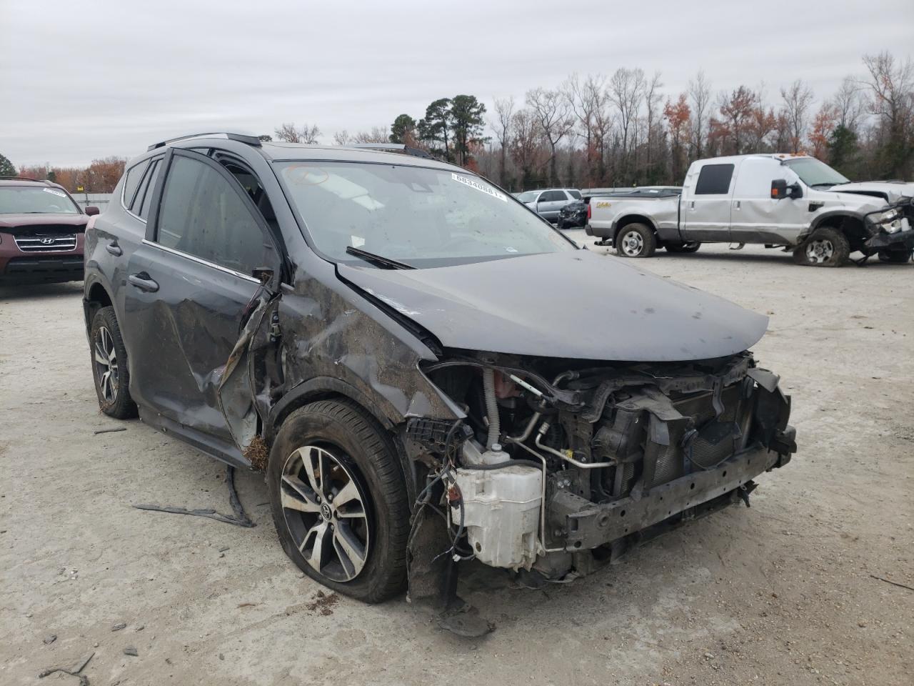 TOYOTA RAV4 XLE 2017 with VIN JTMWFREV6HJ701827 - Photo from auction
