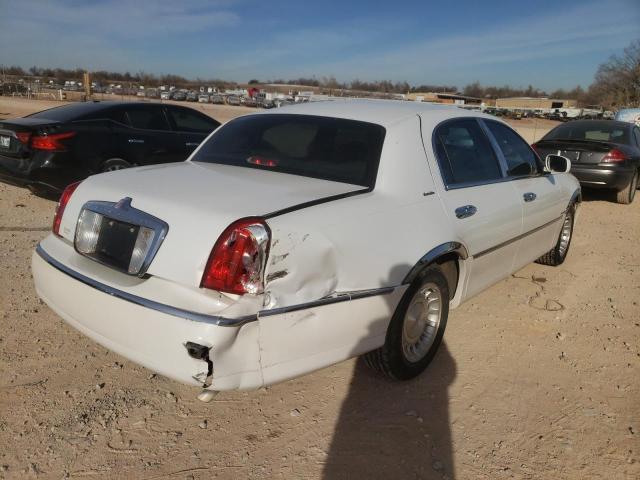 Photo 4 from auction – 2002 LINCOLN TOWN CAR E with VIN 1LNHM81W82Y614142