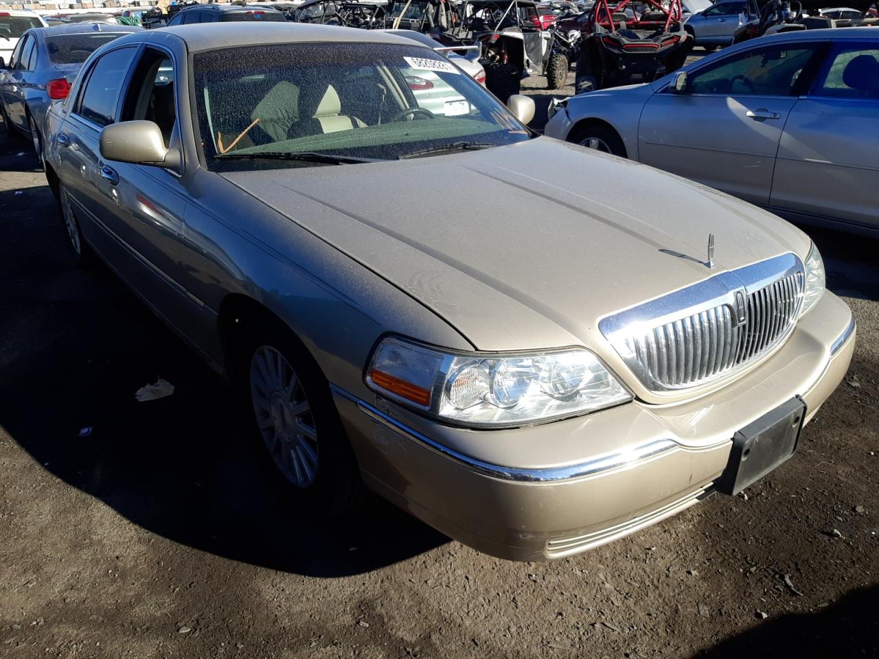 LINCOLN TOWN CAR E 2004 with VIN 1LNHM81W54Y654018 - Photo from auction