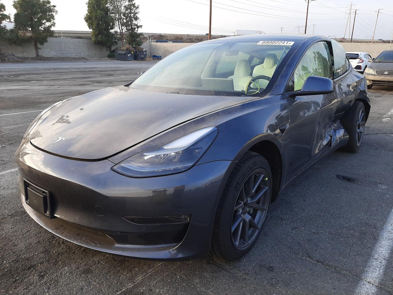 Photo 2 from auction – 2021 TESLA MODEL 3 with VIN 5YJ3E1EB2MF033457