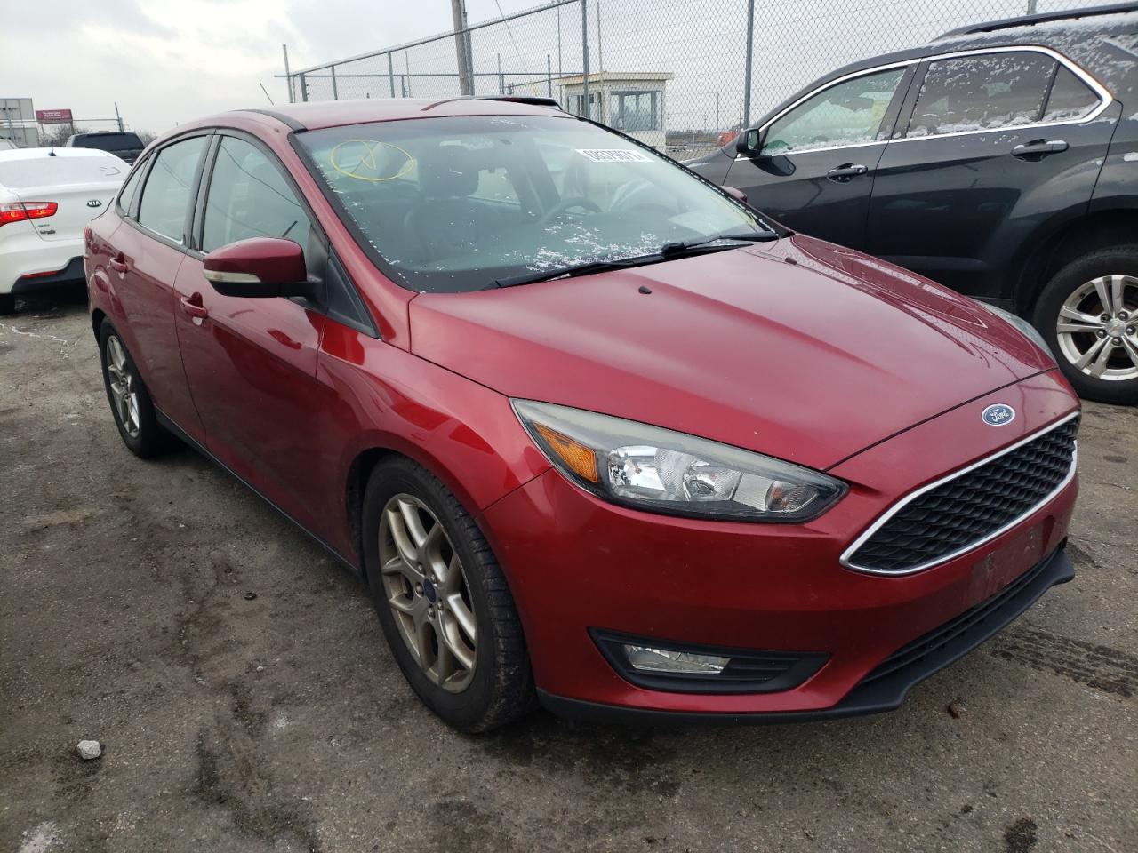FORD FOCUS SE 2015 with VIN 1FADP3F22FL355742 - Photo from auction