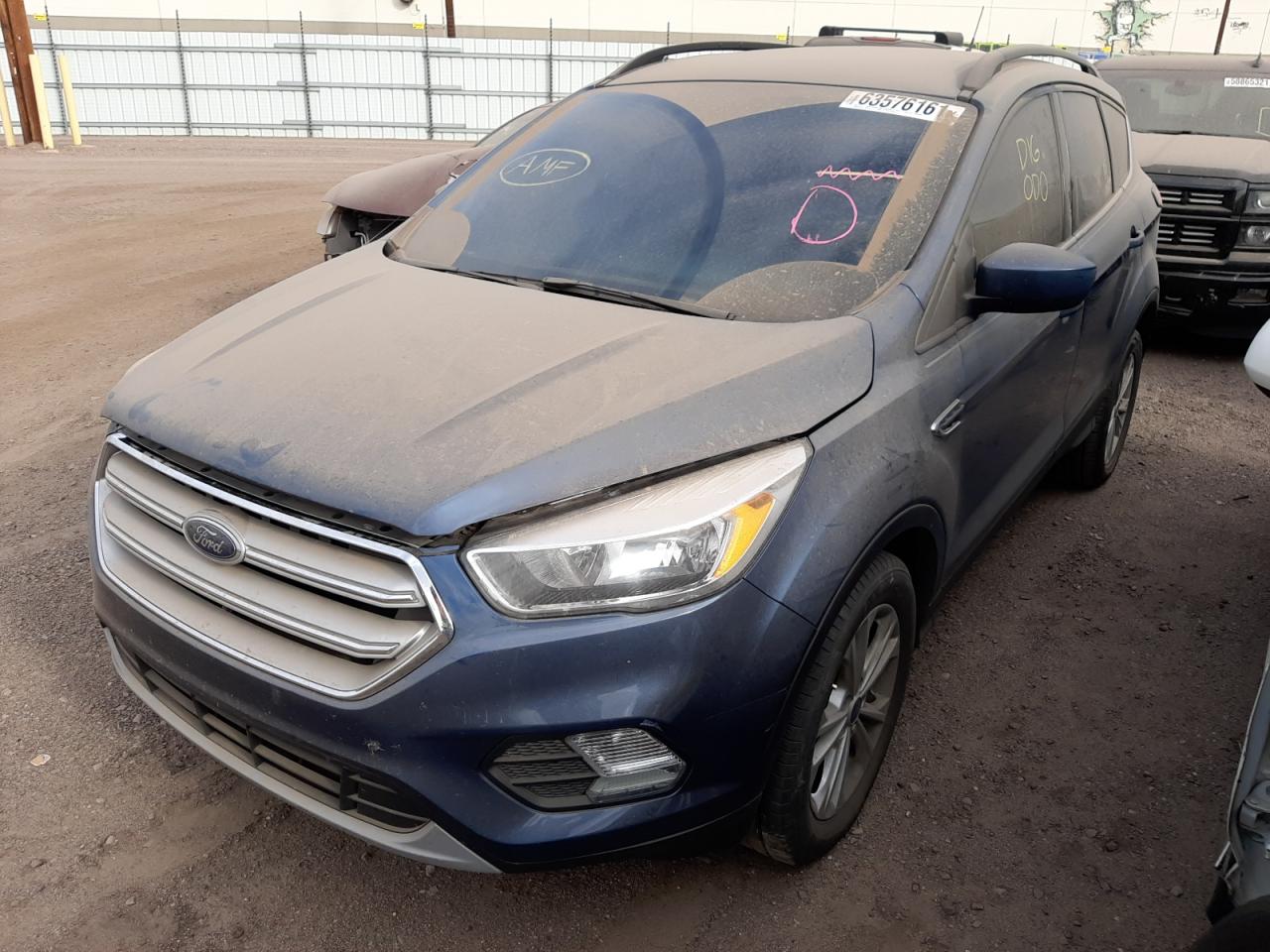 Photo 2 from auction – 2018 FORD ESCAPE SE with VIN 1FMCU0GD8JUB84331