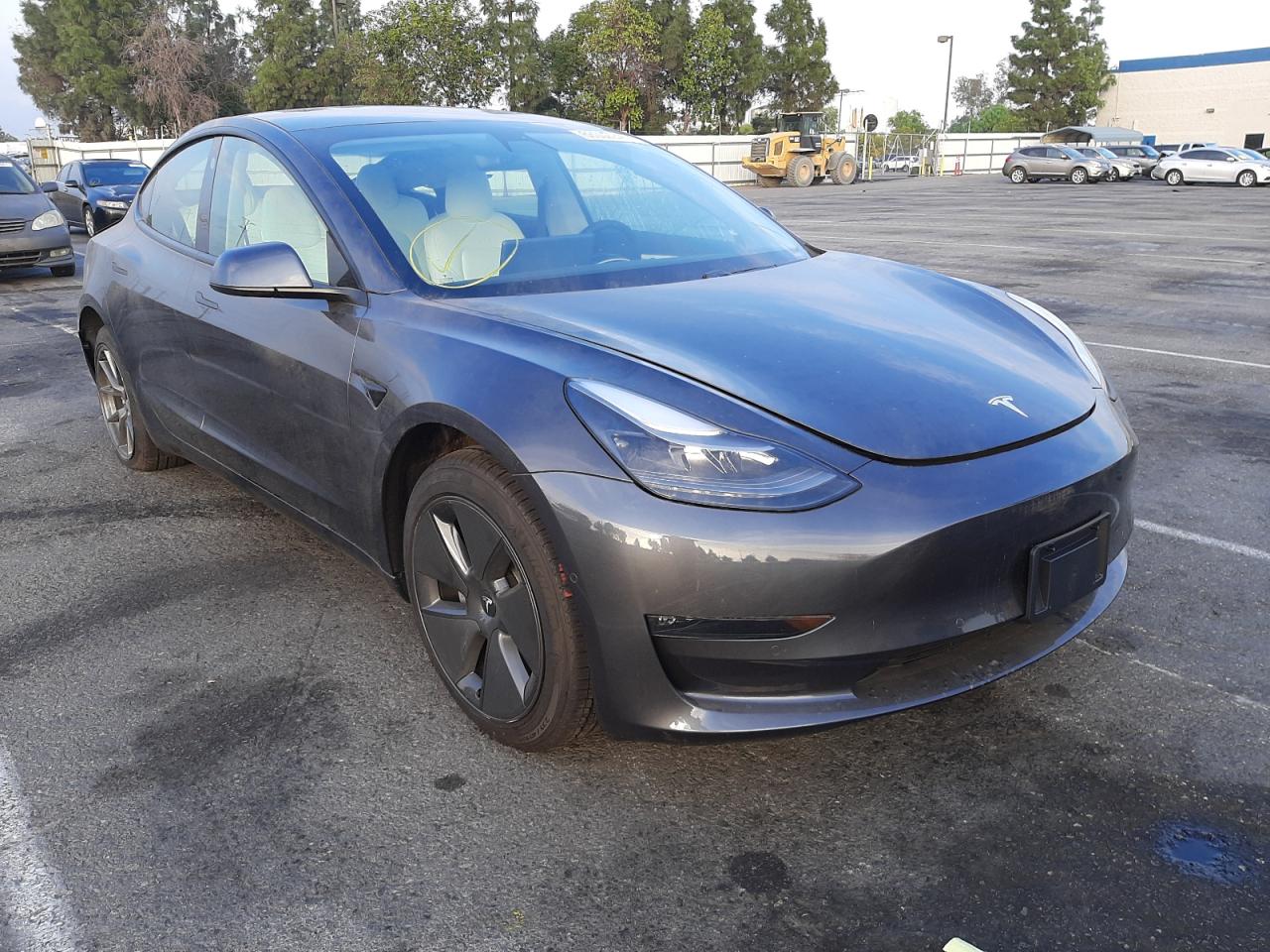 TESLA MODEL 3 2021 with VIN 5YJ3E1EB2MF033457 - Photo from auction