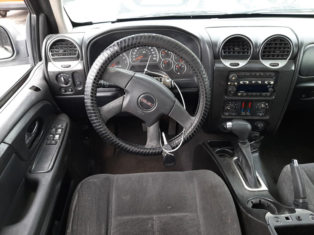 Photo 9 from auction – 2005 GMC ENVOY with VIN 1GKDT13S852137554