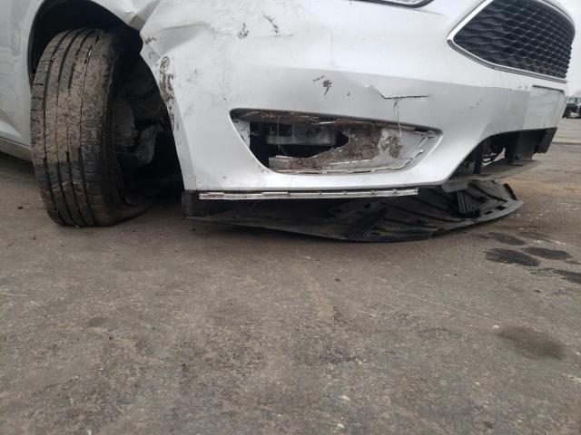 Photo 9 from auction – 2018 FORD FOCUS S with VIN 1FADP3E2XJL284445