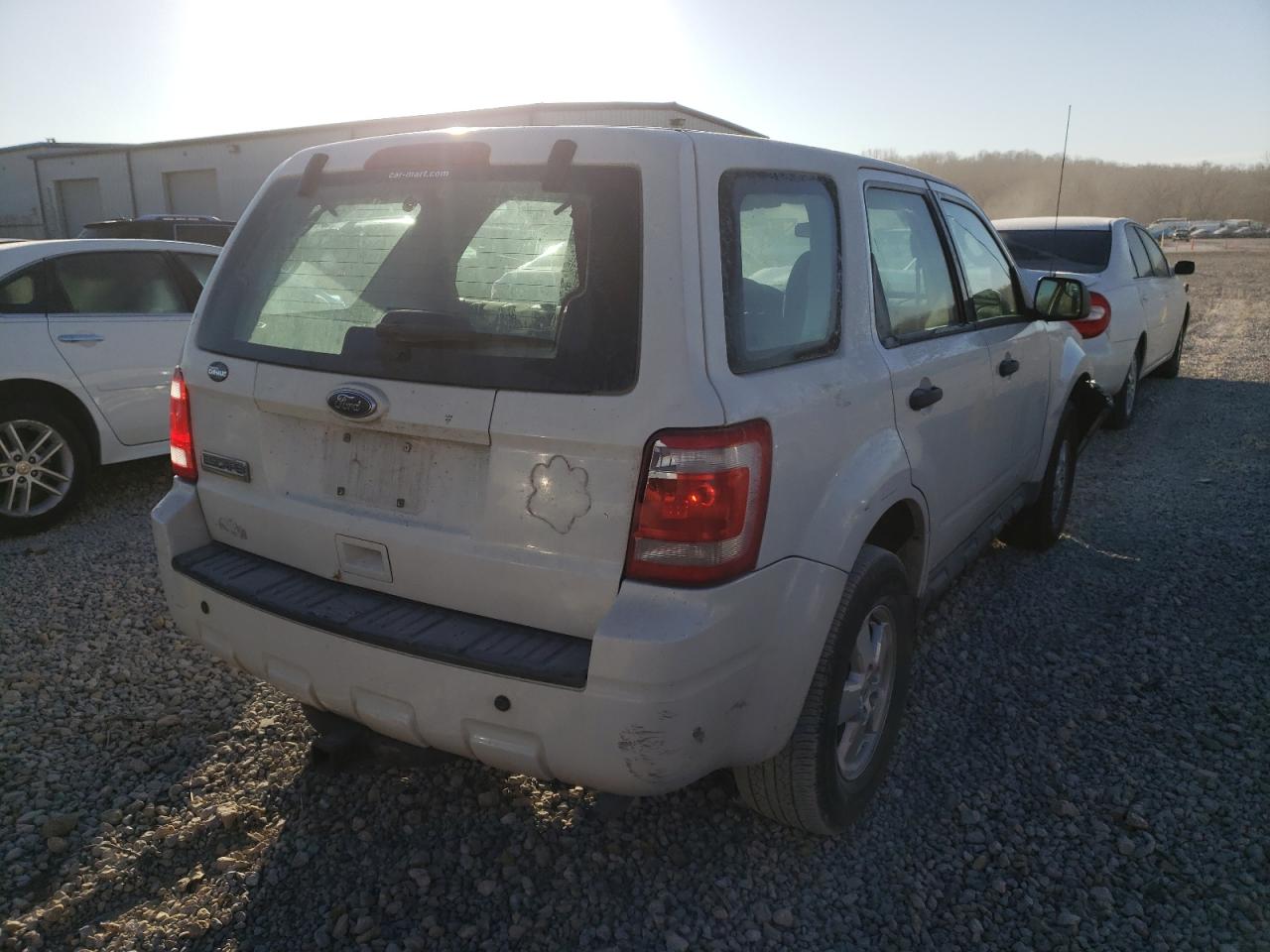 Photo 4 from auction – 2010 FORD ESCAPE XLS with VIN 1FMCU0C75AKA30803