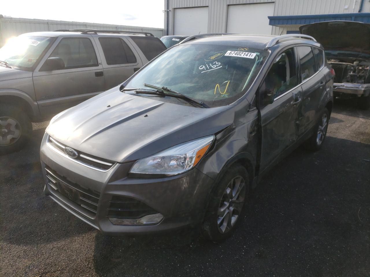Photo 2 from auction – 2014 FORD ESCAPE TIT with VIN 1FMCU9J9XEUD55546