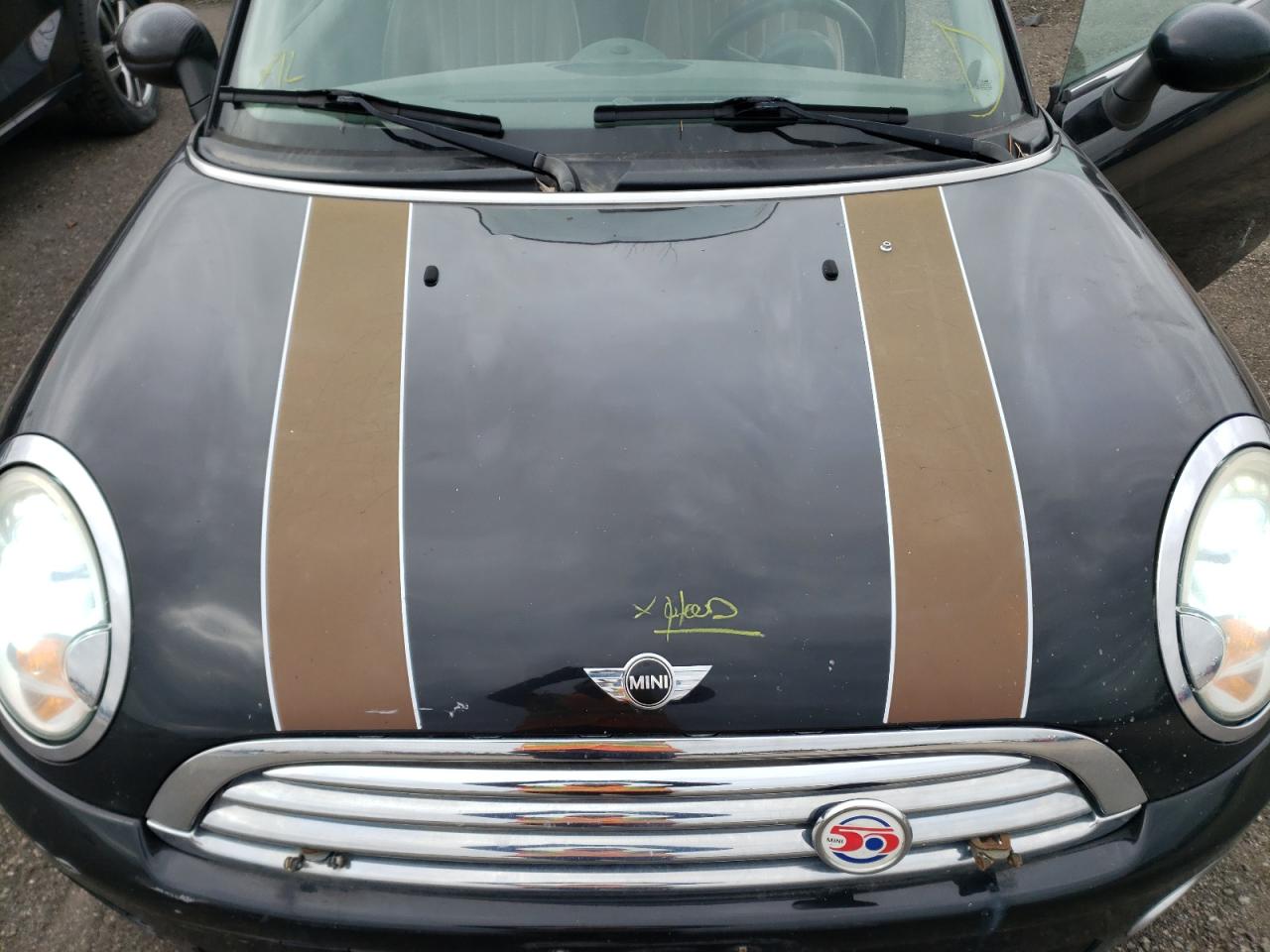 Photo 7 from auction – 2010 MINI COOPER with VIN WMWMF3C57ATU78583